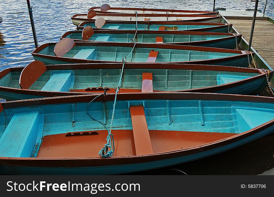 Row of boats in a river dock