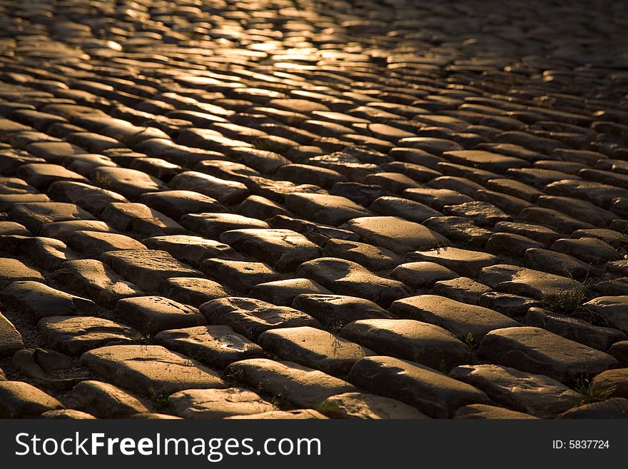 Stone structure of old Prague road. Background texture. Stone structure of old Prague road. Background texture.