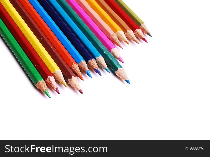 Many colorful pencils isolated on white background