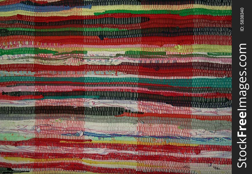 Multi-colour a carpet consisting of linen strings