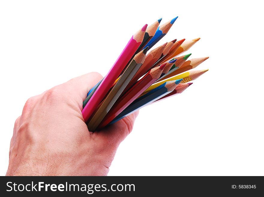 Many colorful pencils in hand isolated on white background