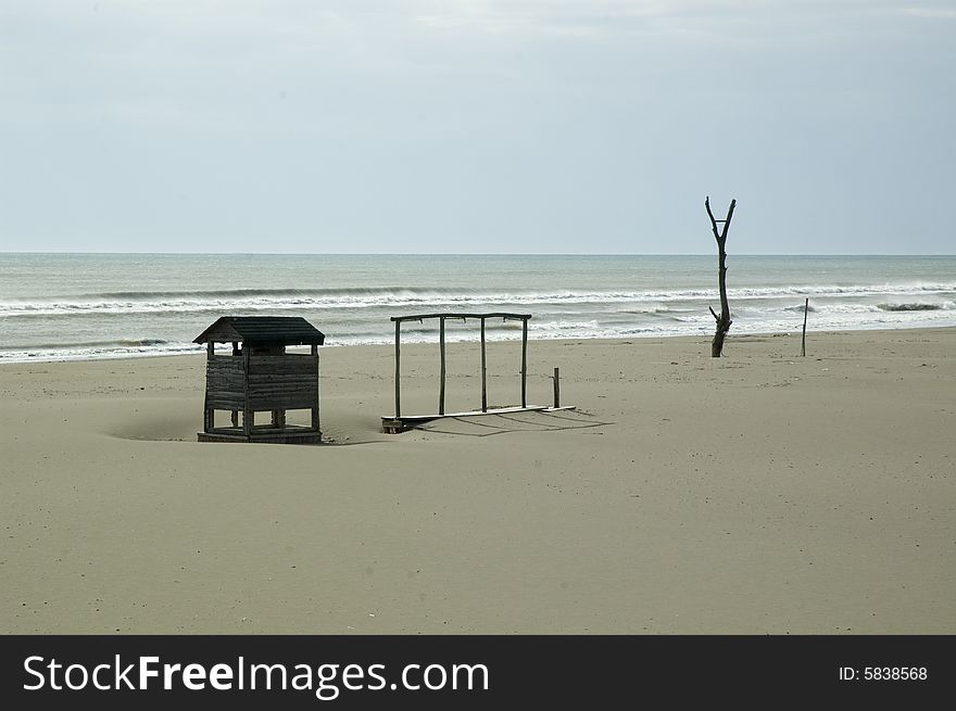 Litlle cabin on the beach with nice textured sand. Litlle cabin on the beach with nice textured sand.