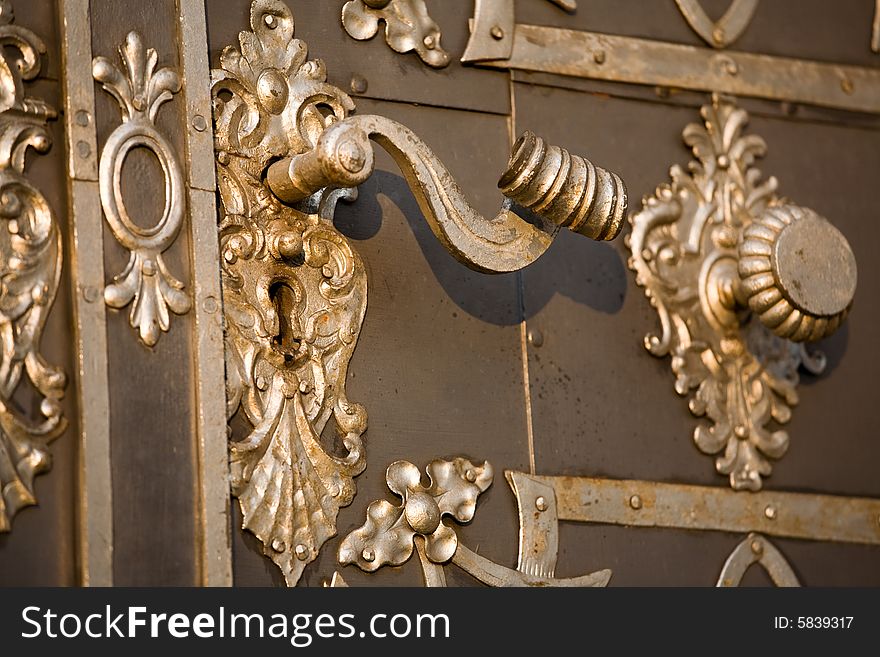 Handle of entrance door to church in Prague. Handle of entrance door to church in Prague.