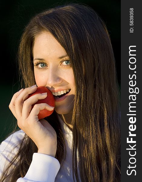 Smilling girl with red apple. Smilling girl with red apple