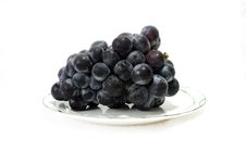 A Branch Of Grape In A Dish Stock Photography A Branch Of Grape In A Dish Stock Photography