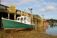 Boat Aground At Wharf Royalty Free Stock Image