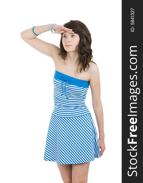 Pretty woman in the blue striped dress looking and waiting. Pretty woman in the blue striped dress looking and waiting
