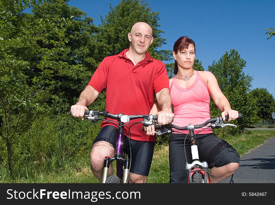 Couple On Bikes - Horizontal