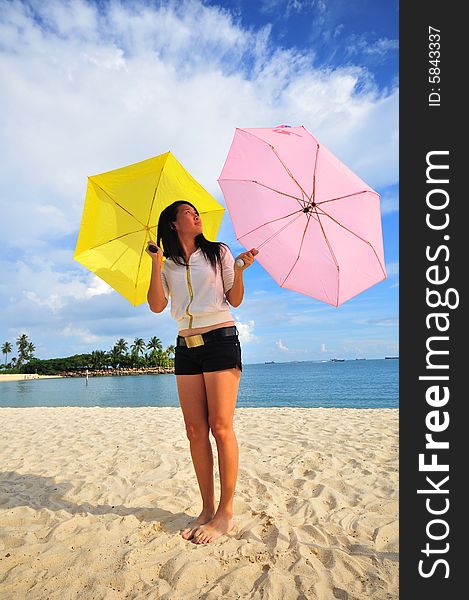 Giel on the beach with two umbrellas. Giel on the beach with two umbrellas.