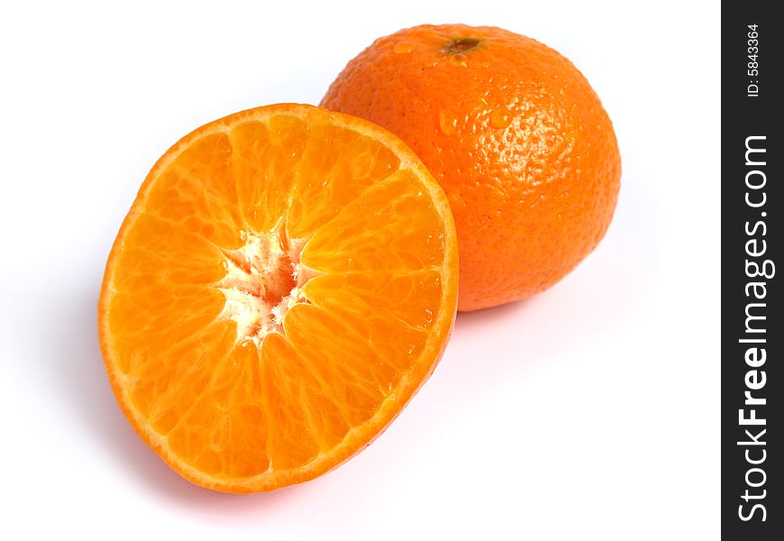 Organic Tangerine and a half, on white background