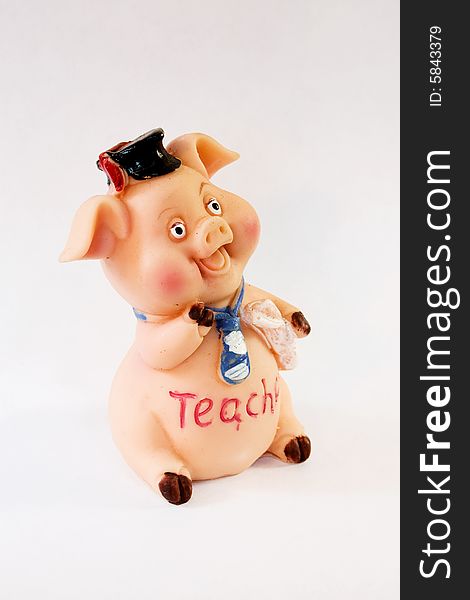 Pig toy figurine on white background