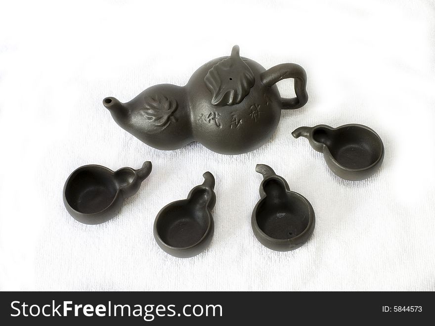 A exquisite calabash shape black Chinese (zisha) clay pot tea set. A exquisite calabash shape black Chinese (zisha) clay pot tea set