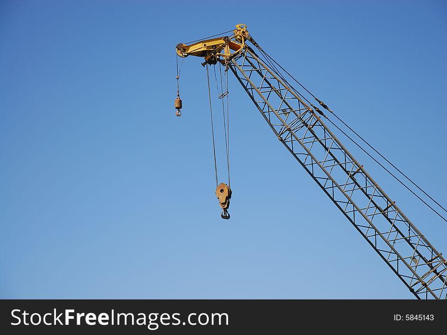 crane isolated by blue sky