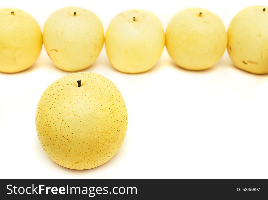 Close up of nashi pear on white background. Close up of nashi pear on white background.