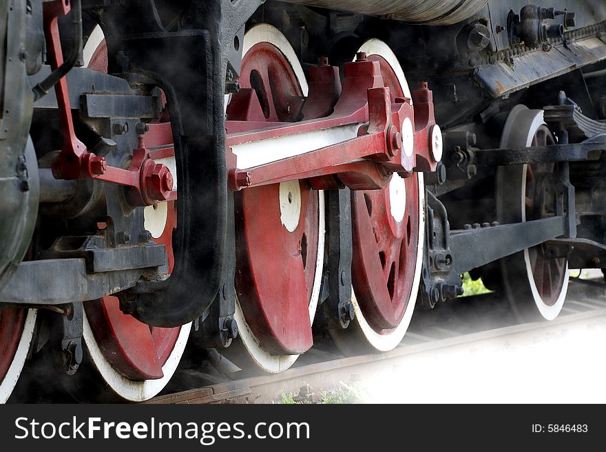 The wheel of an outdated vapour locomotive, it has already had a history of 80 years. The wheel of an outdated vapour locomotive, it has already had a history of 80 years.