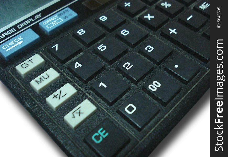 Close-up of a black color calculator on a white background