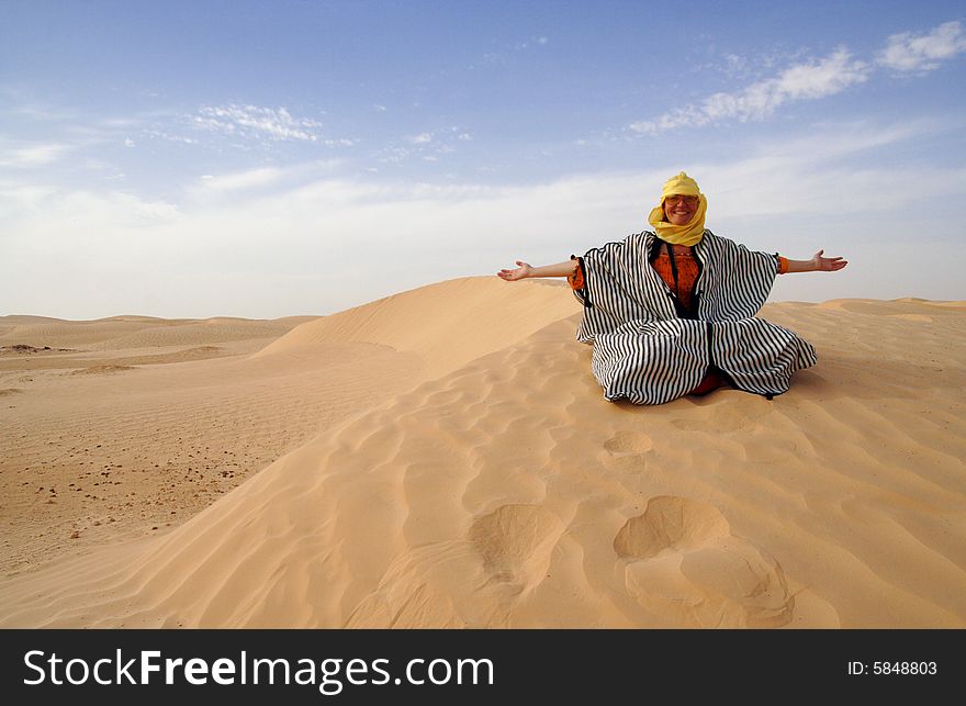 Women in sand of desert. Women in sand of desert