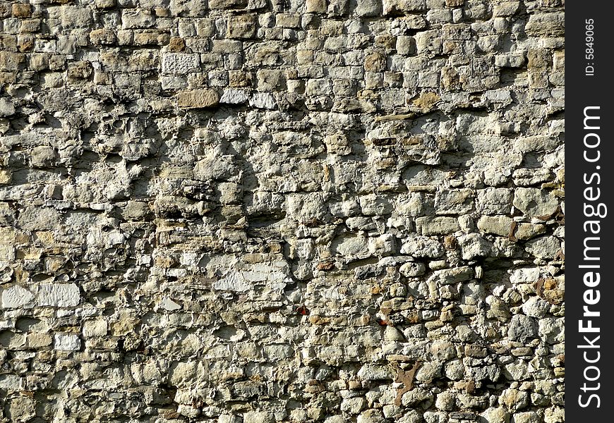 A view of a wall of stones that make up the tower of London in London. It would make a good texture background. A view of a wall of stones that make up the tower of London in London. It would make a good texture background.