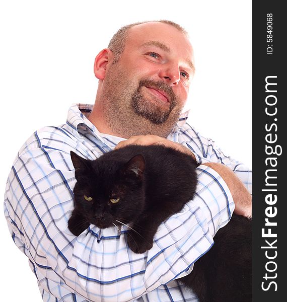 Man holds black cat in hands on white