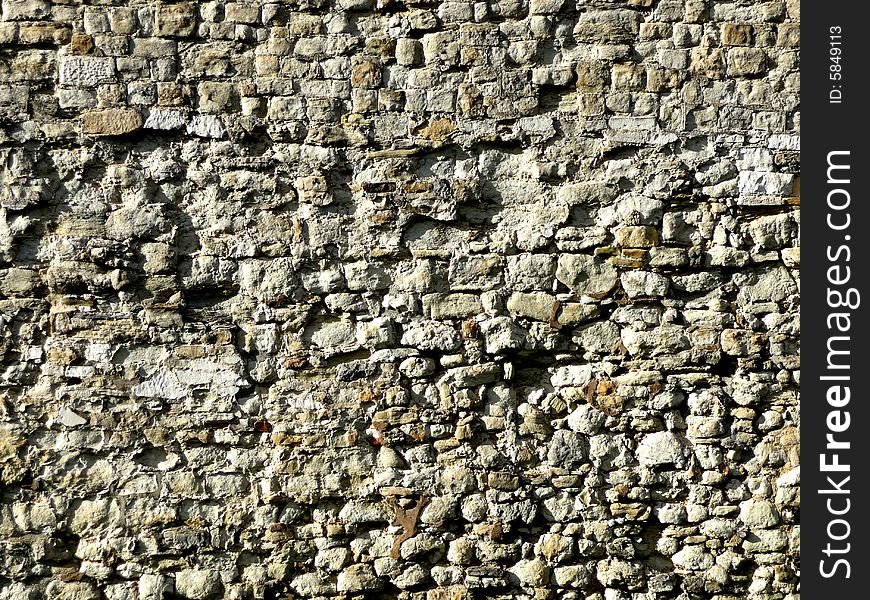 A view of a wall of stones that make up the tower of London in London. It would make a good texture background. A view of a wall of stones that make up the tower of London in London. It would make a good texture background.