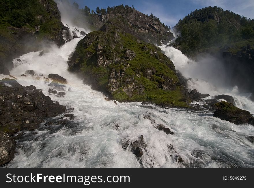 Famous waterfall in norway, one of the few with a permanent tourist stop attached. Famous waterfall in norway, one of the few with a permanent tourist stop attached