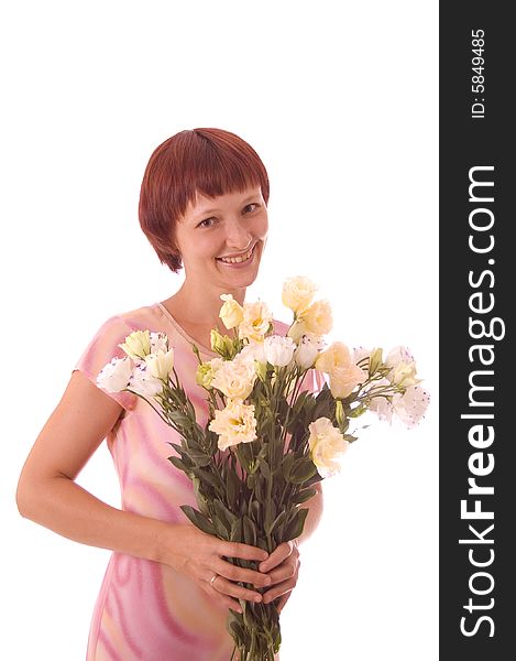 Portrait of red-haired girl with flowers in a high key.