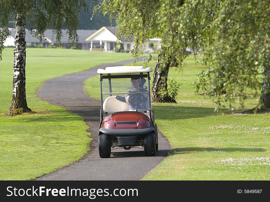 Driving In Golf Cart - Horizontal