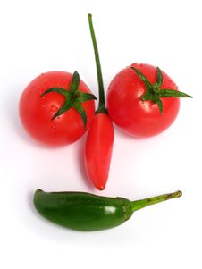 Two Colors Chilies With Tomatoes Stock Image Two Colors Chilies With Tomatoes Stock Image