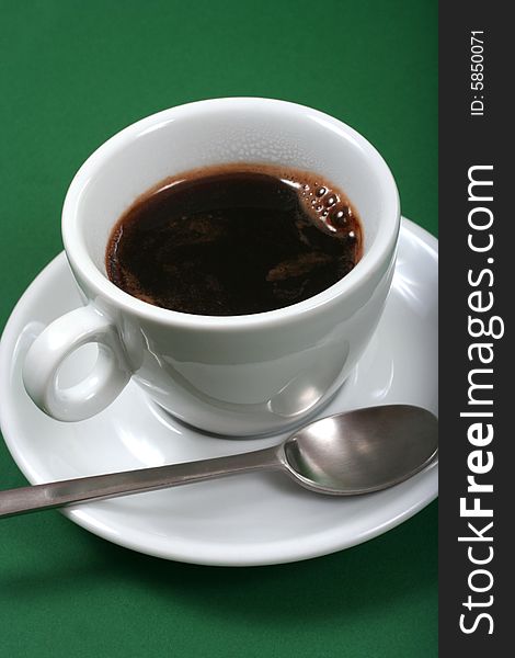 Coffee On Green Background