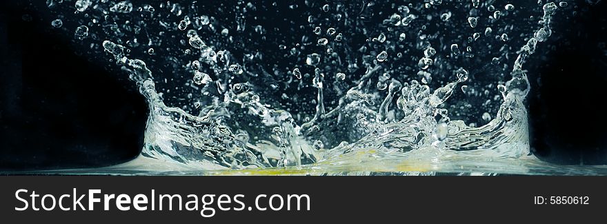 Splashing water on a black background