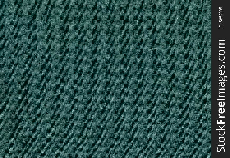 Scan of wrinkled green canvas surface, great for background