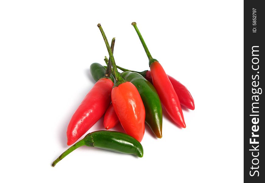 Two colors chilies on white background