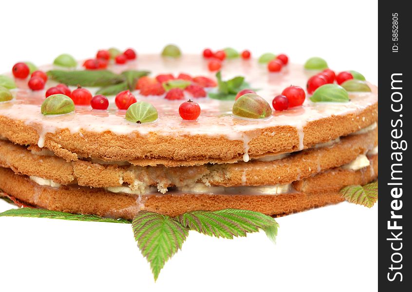 Delicious cake with berries isolated over a white background