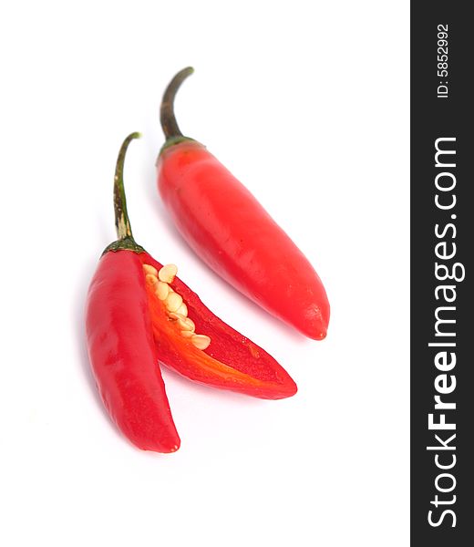 Red chilies on white background