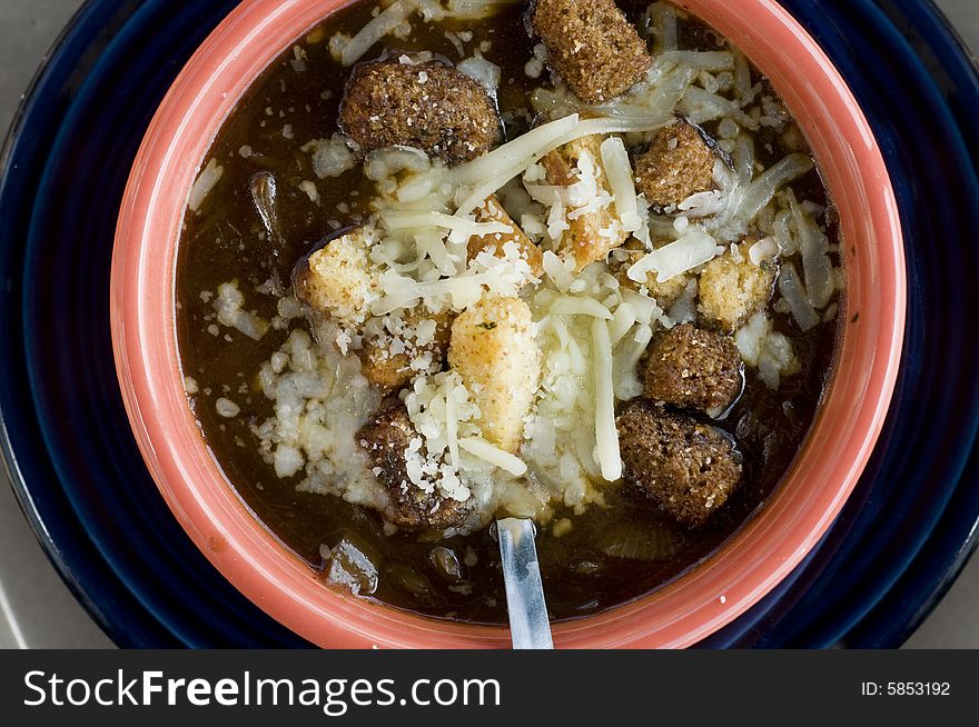 A bowl of hot delicious French onion soup