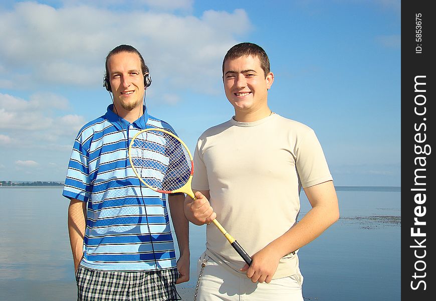 Leisure. Two young men on the riverside. Leisure. Two young men on the riverside.