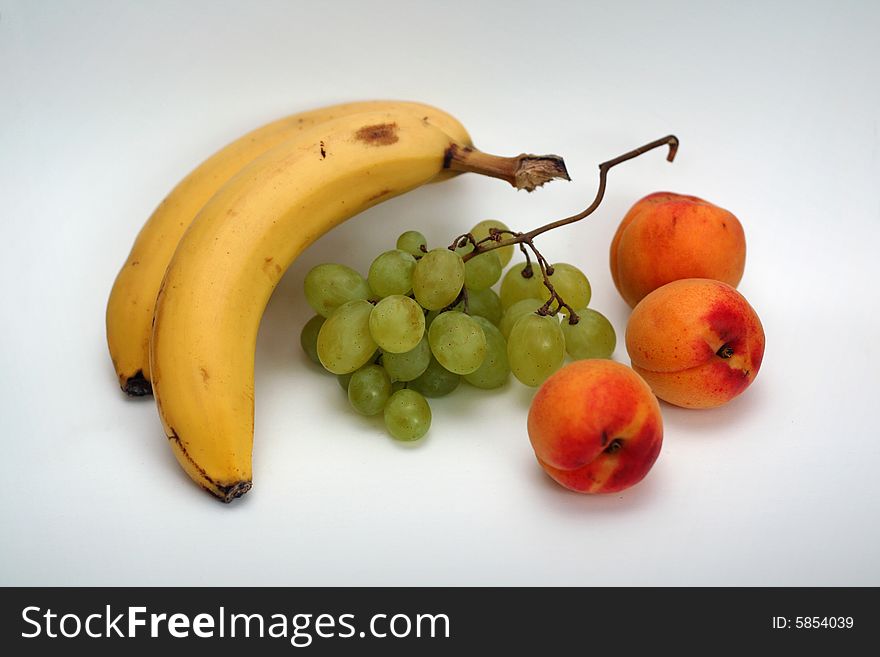 Bananas, Apricots And Grapes