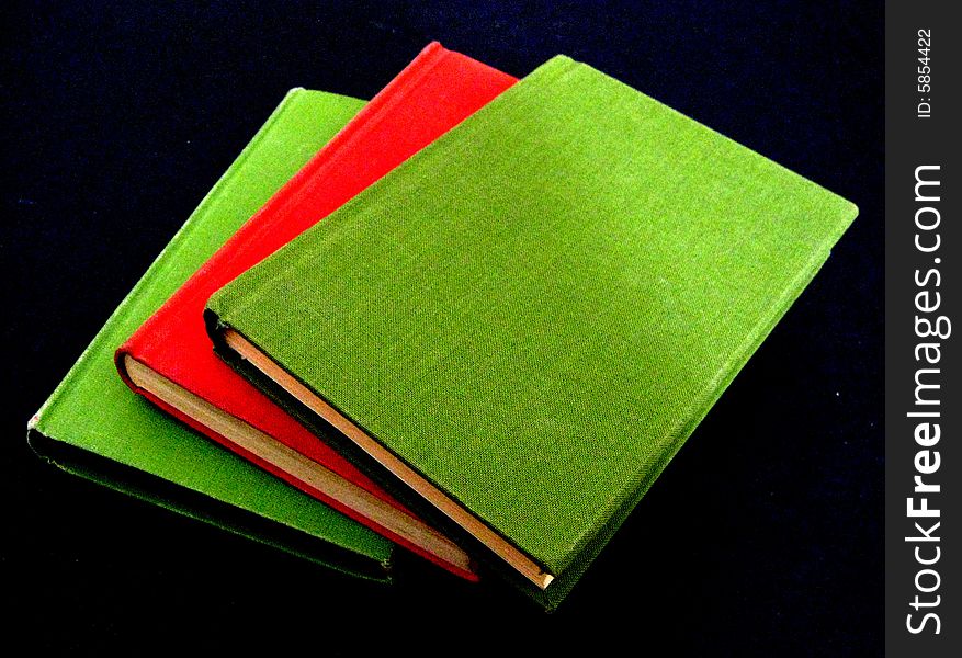 A photographic image of three books. A photographic image of three books