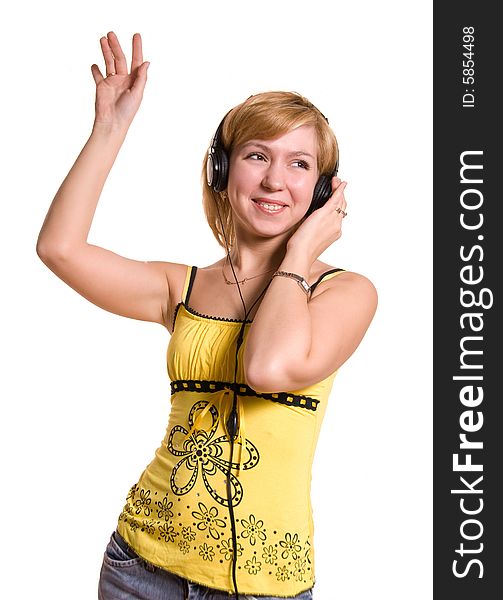 Pretty young woman listening to the music on white background