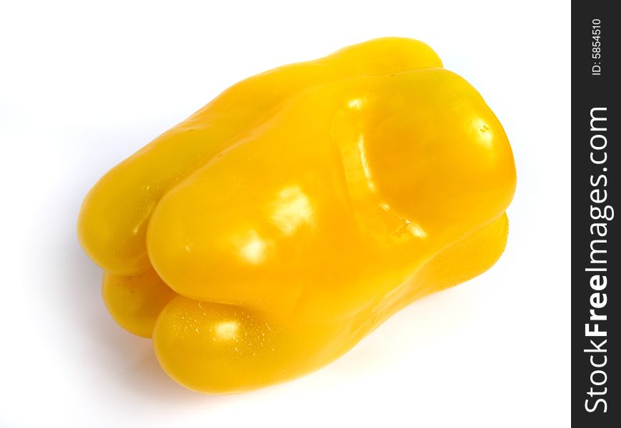 Yellow pepper wet on white background