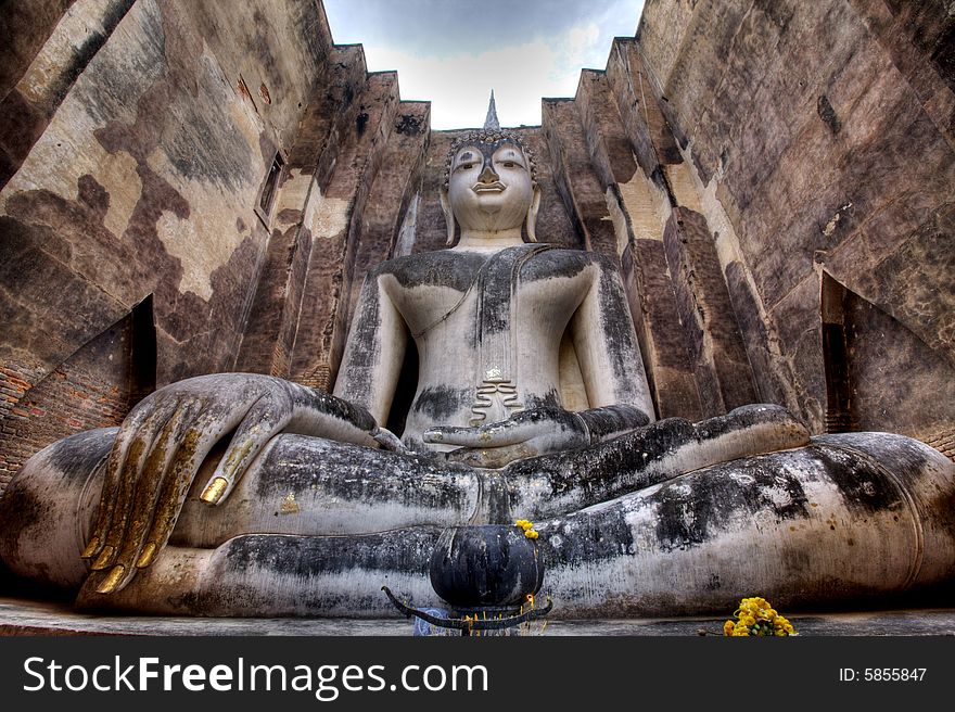 The photo of the big Bhudda located in the World Heritage place at Sukhithai province, Thailand