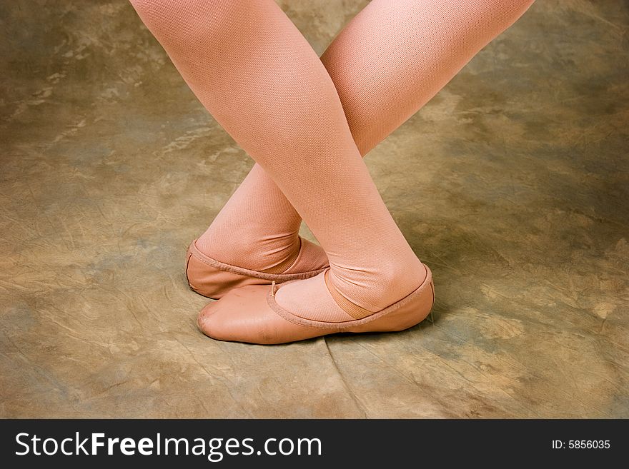 Ballet dancer's flexible legs and feet - walking left and right at the same time. Ballet dancer's flexible legs and feet - walking left and right at the same time