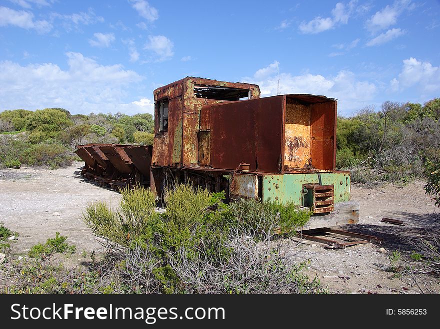 A discarded piece of the industrial past. This old rusting diesel locomotive was used by the early pioneers to haul gypsum and other mining materials. Inneston, Innes National Park, Yorke Peninsula, South Australia. A discarded piece of the industrial past. This old rusting diesel locomotive was used by the early pioneers to haul gypsum and other mining materials. Inneston, Innes National Park, Yorke Peninsula, South Australia.