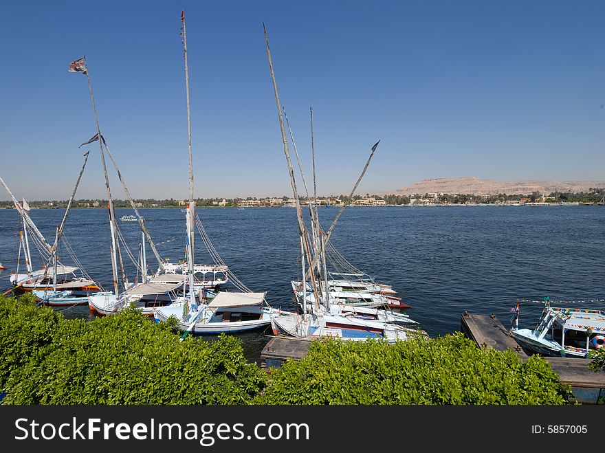 Sailing boats on Nile river. City Luxor, Egypt.