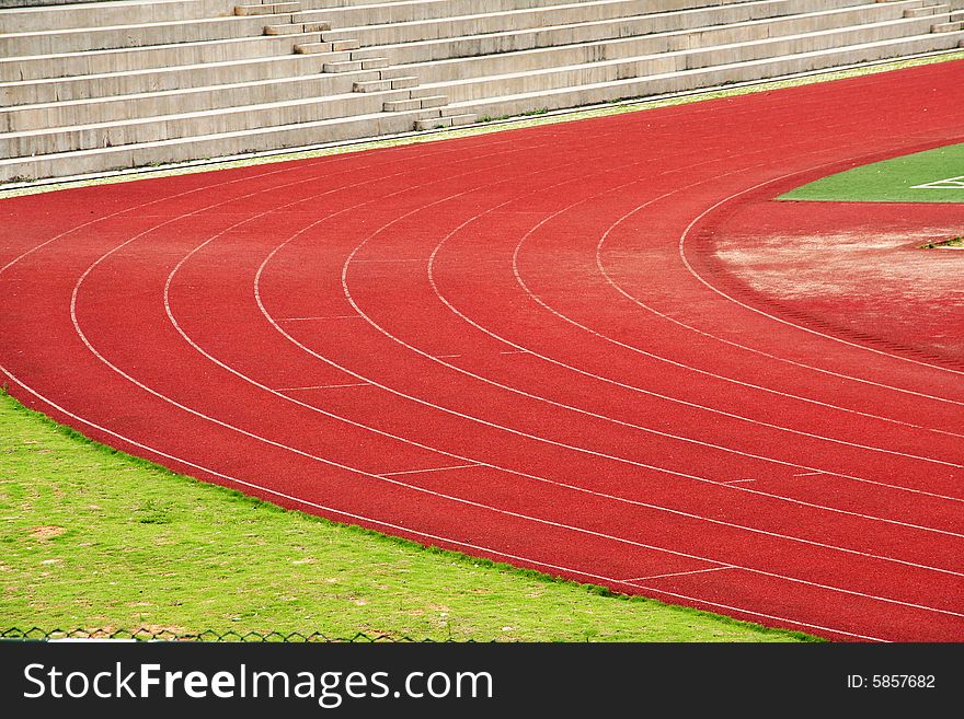 Red race track in an arena