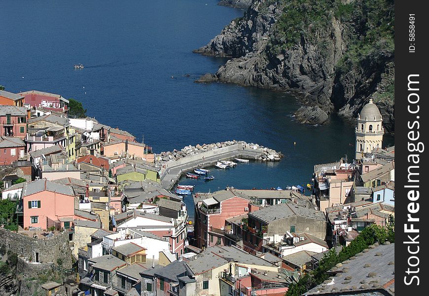 A village in Cinque Terre, Italy on the coast of the Mediterranean Sea. A village in Cinque Terre, Italy on the coast of the Mediterranean Sea