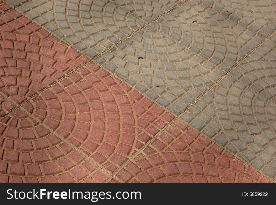 Close-up of new old-style pavement of stoneblocks (bricks) of red color