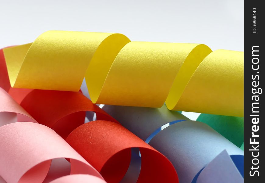 Colorful paper springs on white