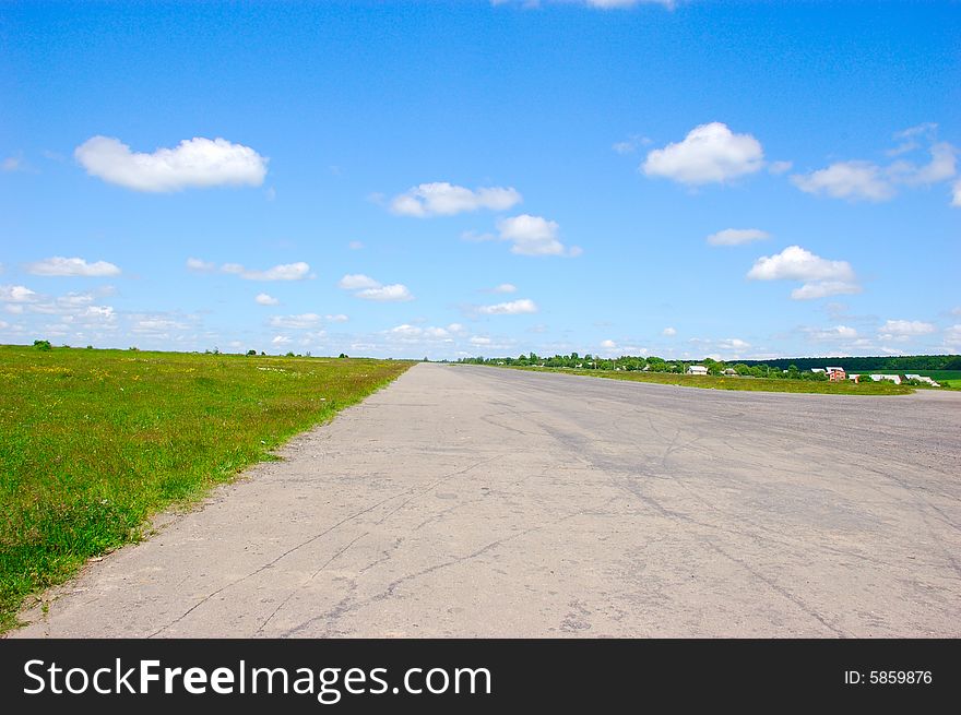 Long wide summer road in Ukraine. Long wide summer road in Ukraine