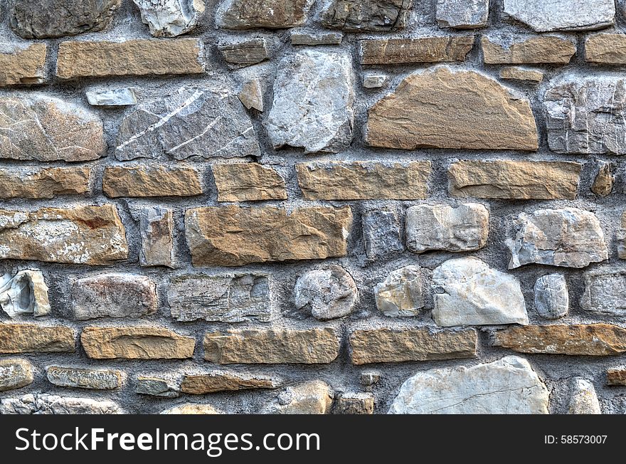 Stone wall background closeup view